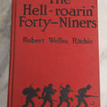Lot 160 - "The Hell-Roarin' Forty-Niners" Vintage Book By Robert Welles Ritchie, Red Cloth Boards With Black Silhouette Illustration Of Miners, J.H. Sears & Company, Publishers, New York, 1928