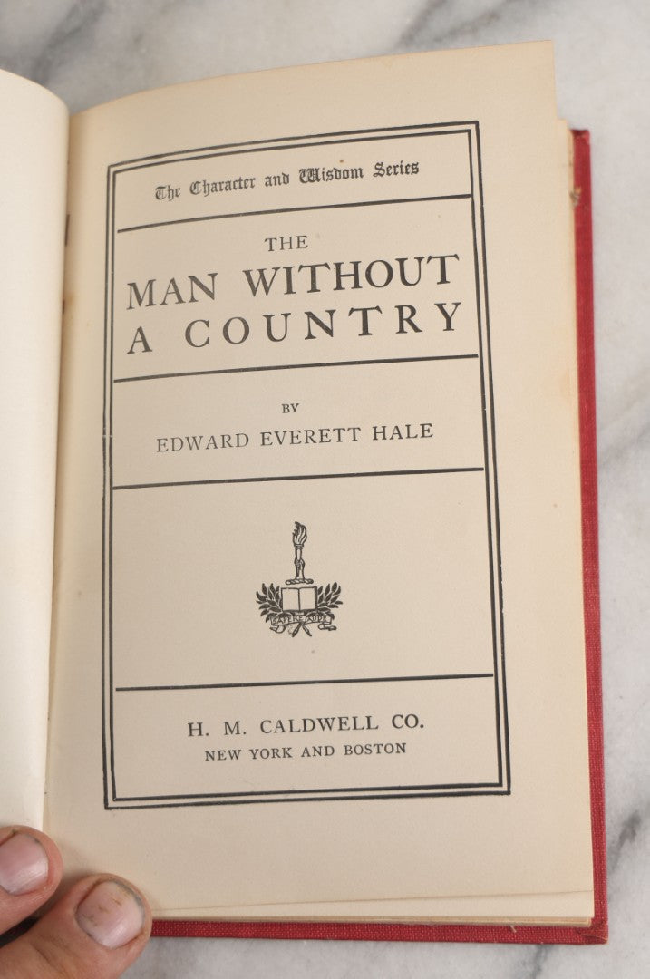 Lot 161 - "The Man Without A Country" Antique Book By Edward Everett Hale, Character And Wisdom Series, Decorative Red Cloth Spine With Gilt Floral Design And Pictorial Cover, H.M. Caldwell Co., Publishers, New York And Boston, Circa 1900
