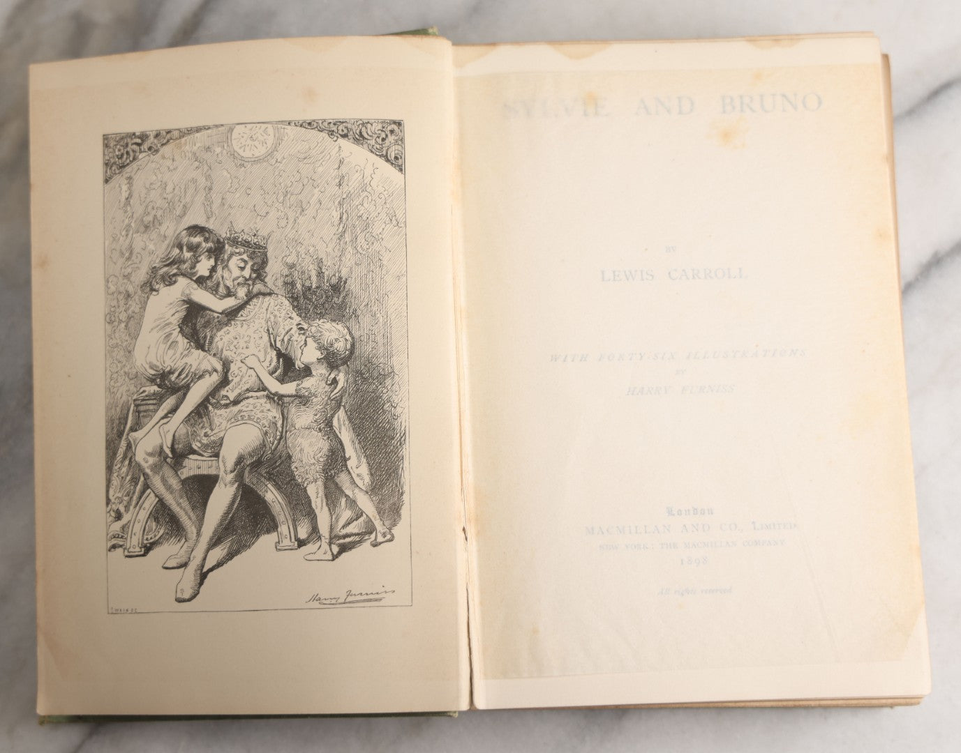 Lot 188 - Pair Of Antique Books, "Sylvie And Bruno" And "Sylvie And Bruno Concluded" By Lewis Carroll, Matching Illustrated Green Cloth Covers With Red And Black Designs, Macmillan And Co., Limited, Publisher, London, 1898