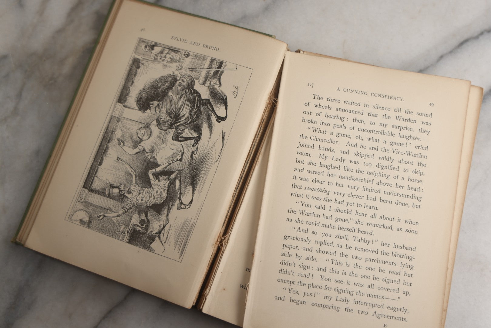 Lot 188 - Pair Of Antique Books, "Sylvie And Bruno" And "Sylvie And Bruno Concluded" By Lewis Carroll, Matching Illustrated Green Cloth Covers With Red And Black Designs, Macmillan And Co., Limited, Publisher, London, 1898