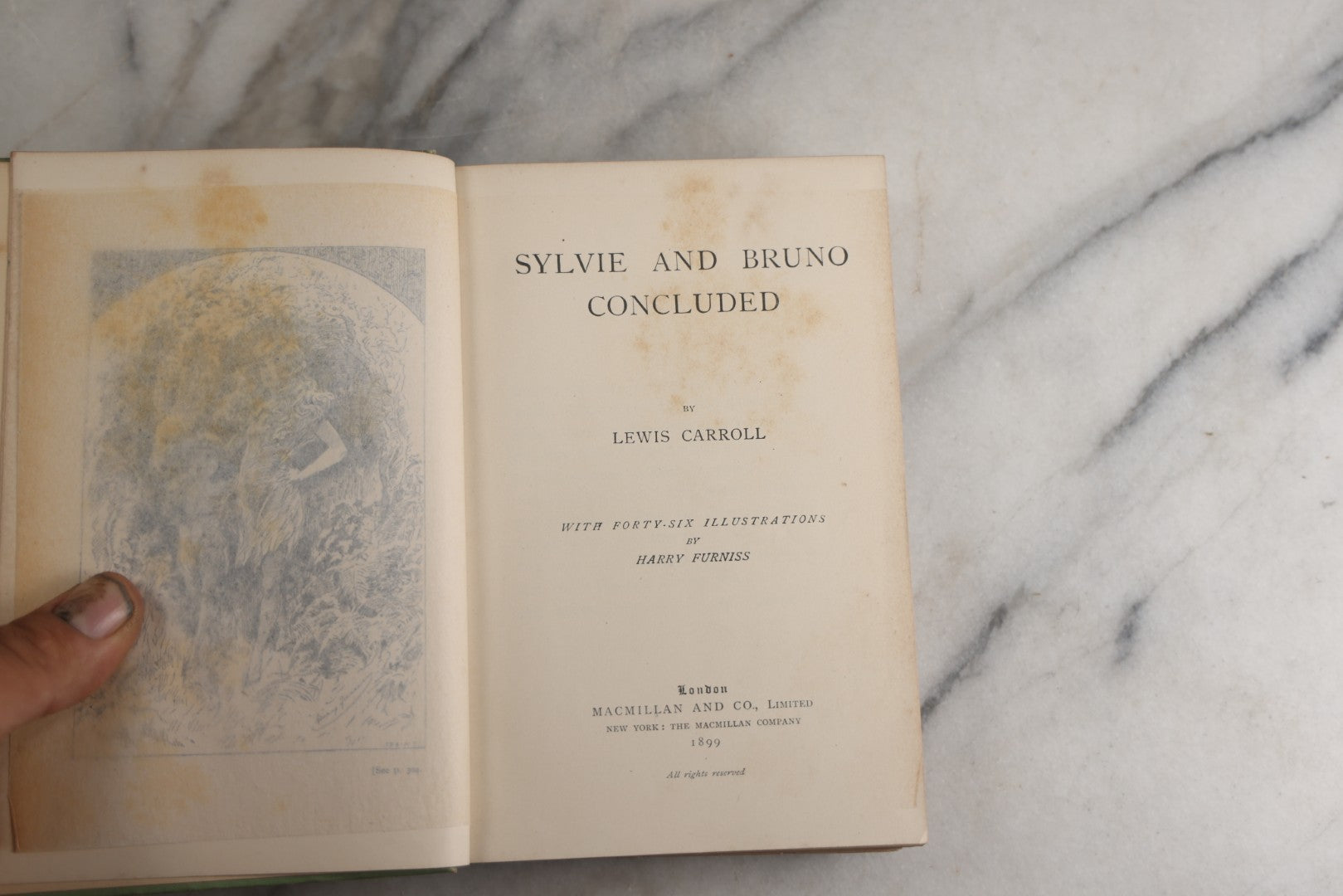Lot 188 - Pair Of Antique Books, "Sylvie And Bruno" And "Sylvie And Bruno Concluded" By Lewis Carroll, Matching Illustrated Green Cloth Covers With Red And Black Designs, Macmillan And Co., Limited, Publisher, London, 1898