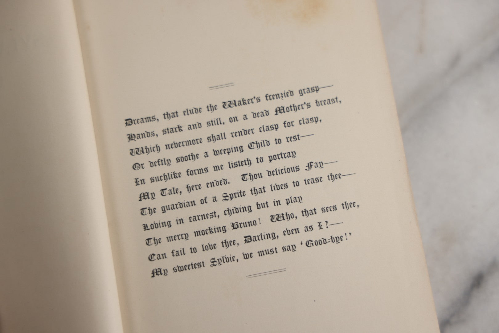 Lot 188 - Pair Of Antique Books, "Sylvie And Bruno" And "Sylvie And Bruno Concluded" By Lewis Carroll, Matching Illustrated Green Cloth Covers With Red And Black Designs, Macmillan And Co., Limited, Publisher, London, 1898