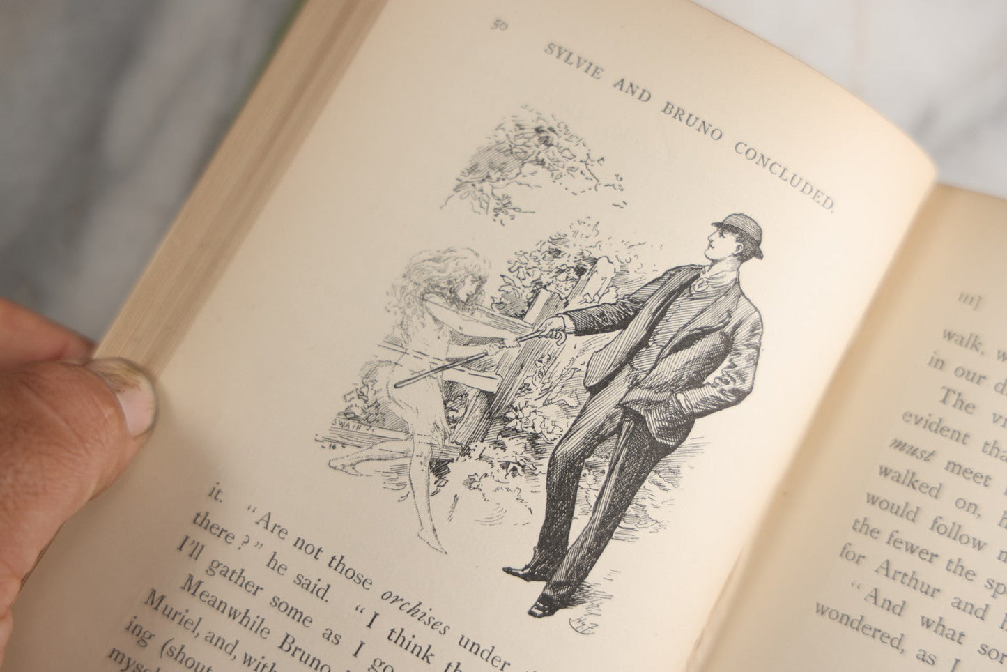 Lot 188 - Pair Of Antique Books, "Sylvie And Bruno" And "Sylvie And Bruno Concluded" By Lewis Carroll, Matching Illustrated Green Cloth Covers With Red And Black Designs, Macmillan And Co., Limited, Publisher, London, 1898