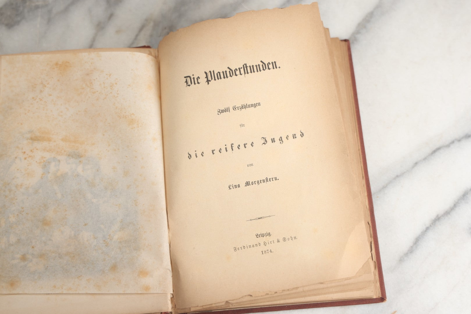 Lot 189 - "Die Plauderstunden" (“The Chatting Hours: Twelve Tales For Older Youth”) Antique German Language Children's Book By Lina Morgenstern, Ferdinand Hirt & Sons, Publishers, Leipzig, 1874, Note Cover Boards Warped