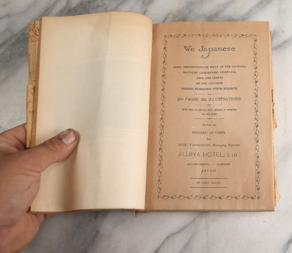 Lot 191 - "We Japanese" Vintage Book By Frederic De Garis For H.S.K. Yamaguchi, Managing Director, Fujiya Hotel, Ltd., Miyanoshita, Hakone, Japan, Describing Customs, Ceremonies, Festivals, Arts Of Japan With 355 Illustrations, Circa 1940s