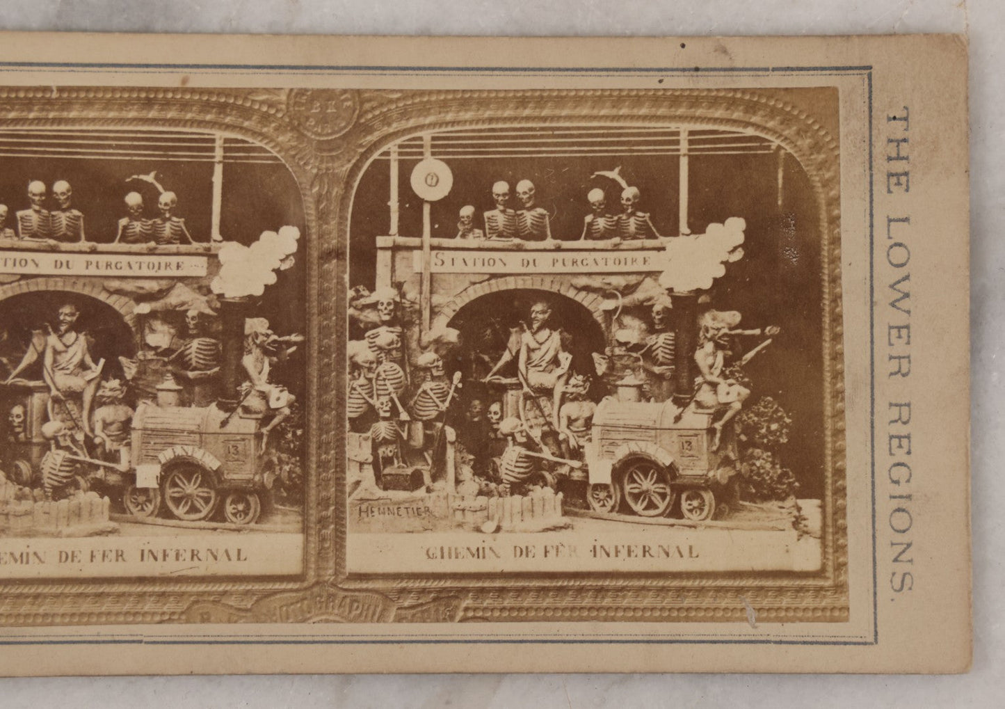 Lot 016 - Antique Stereoview Stereo Optic 3D Diablerie Photo Card, "Chemin De Fer Infernal” (Infernal Railway, Railway To Hell), Skeletons And Devils At Purgatory Train Station, "A Voyage Through The Lower Regions"