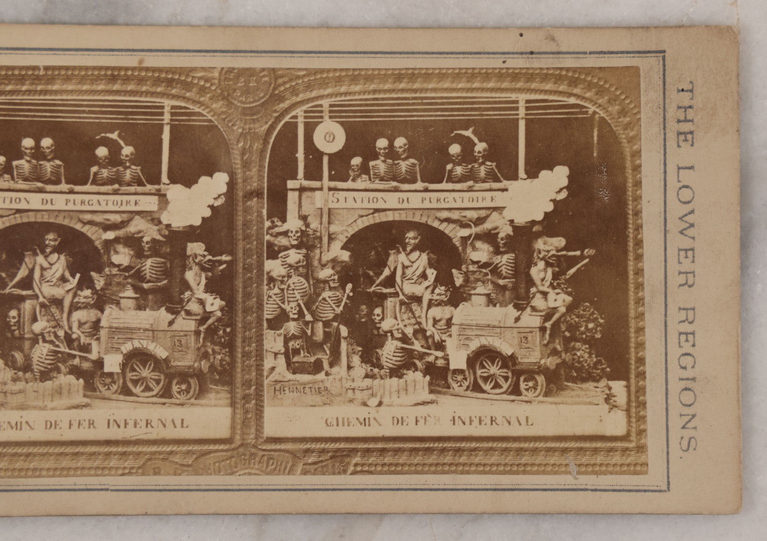 Lot 016 - Antique Stereoview Stereo Optic 3D Diablerie Photo Card, "Chemin De Fer Infernal” (Infernal Railway, Railway To Hell), Skeletons And Devils At Purgatory Train Station, "A Voyage Through The Lower Regions"