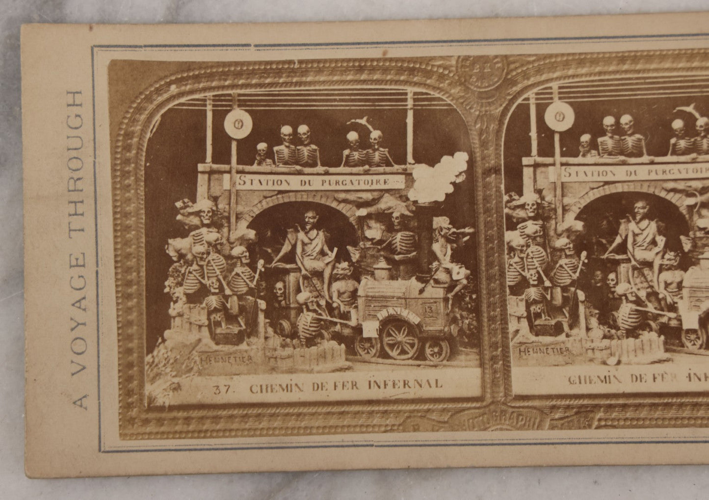 Lot 016 - Antique Stereoview Stereo Optic 3D Diablerie Photo Card, "Chemin De Fer Infernal” (Infernal Railway, Railway To Hell), Skeletons And Devils At Purgatory Train Station, "A Voyage Through The Lower Regions"