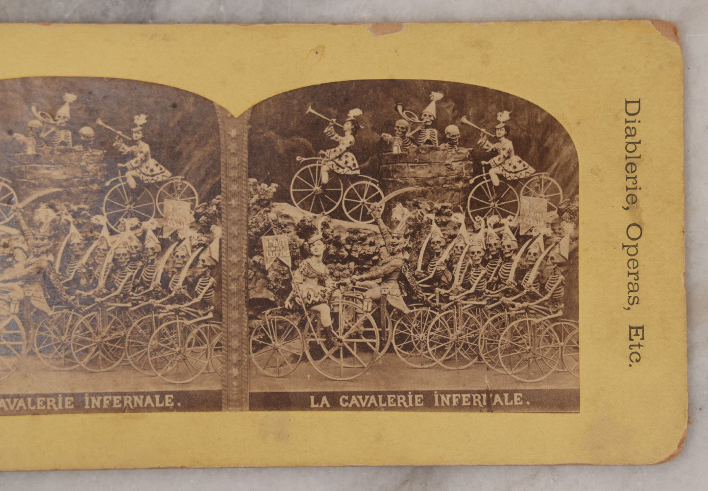Lot 017 - Antique Stereoview Stereo Optic 3D Diablerie Photo Card, “La Cavalerie Infernale” (Infernal Cavalry, Hell's Cavalry), Skeletons And Devils On Bicycles, "New Series"
