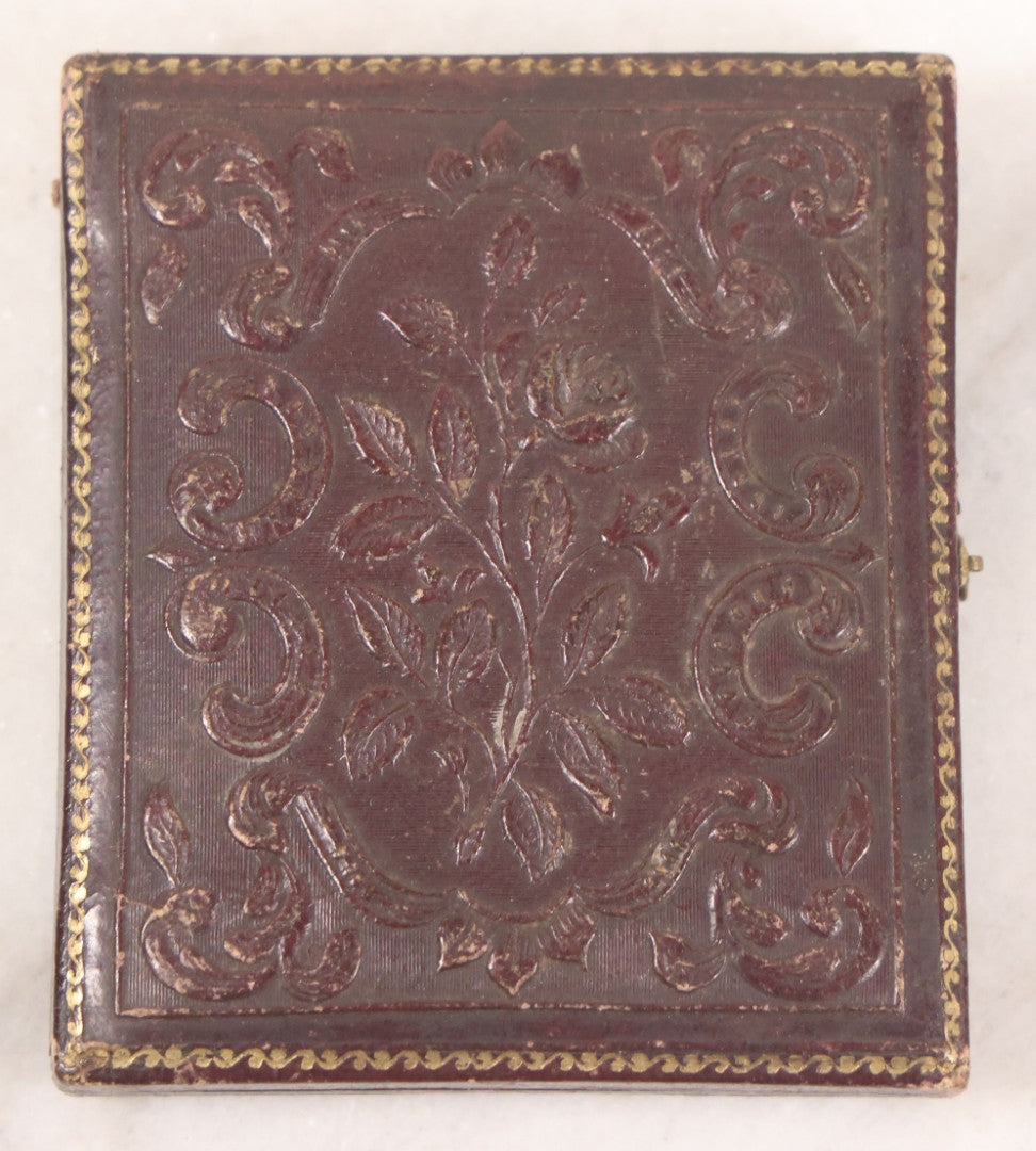 Lot 028 - Antique 1/6th Plate Daguerreotype Photograph Of A Middle Aged Man With A Chin Strap Beard, Photographed By Bell & Clayton, Philadelphia, Marked On Case Pillow, In Full Intact Leatherette Union Case, Circa 1855