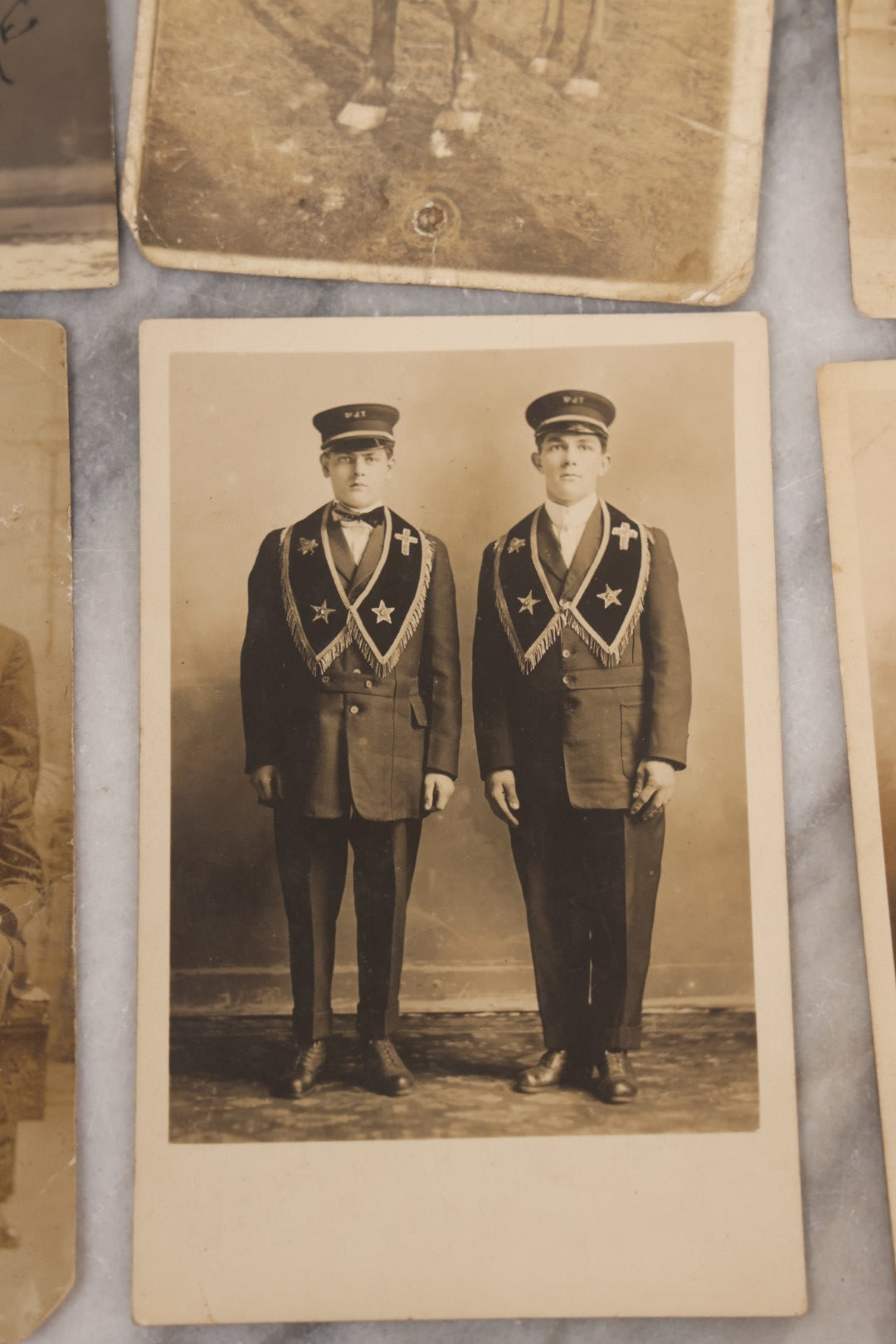 Lot 085 - Grouping Of 18 Antique Real Photo Postcards R.P.P.C. Of Men And Boys, Including Men In Overalls, Knights Templar / Freemasons, Sailors, Men Smoking, And More