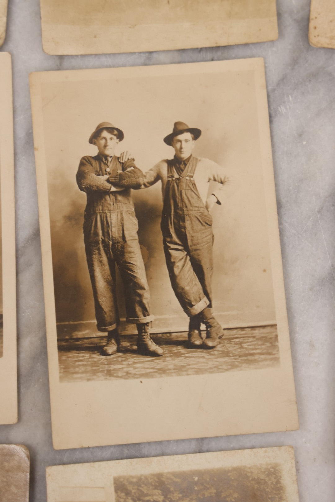 Lot 085 - Grouping Of 18 Antique Real Photo Postcards R.P.P.C. Of Men And Boys, Including Men In Overalls, Knights Templar / Freemasons, Sailors, Men Smoking, And More