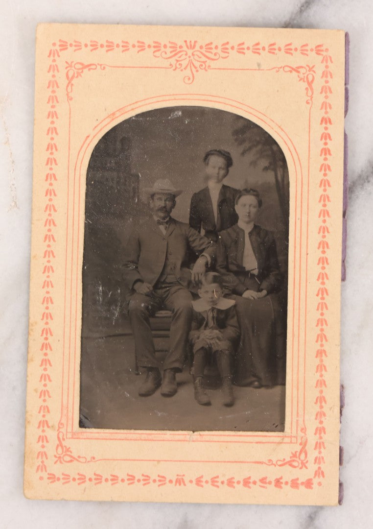 Lot 089 - Pair Of Antique Tintype Photographs, Two Identical Photographs Of Family With Young Boy In Paper Arch Cut Frame 