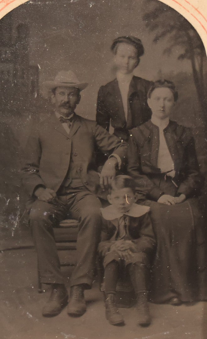 Lot 089 - Pair Of Antique Tintype Photographs, Two Identical Photographs Of Family With Young Boy In Paper Arch Cut Frame 