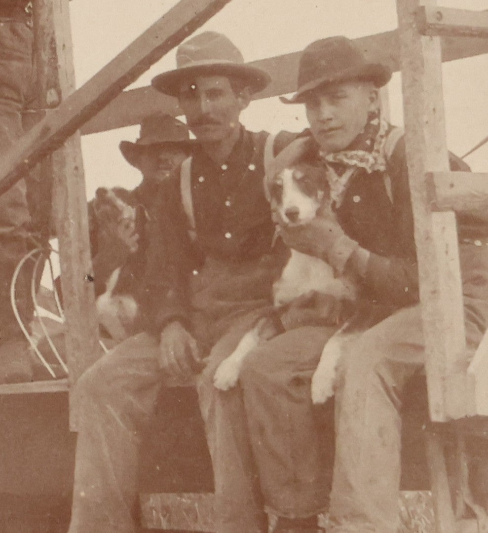 Lot 096 - Antique Boarded Occupational Photograph Of A Group Of Farm Workers Posing With Their Dog On A Wooden Cart