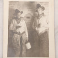 Lot 098 - Single Antique Real Photo Postcard R.P.P.C. Of Two Men Dressed As Cowboys Posing With Pistols And Whiskey