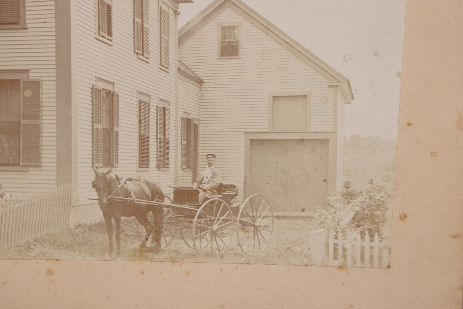 Lot 110 - Boarded Photo Of House Of Dr. E.W. Hoosoon With White Picket Fence, Family Outside, Man On Horse-Drawn Wagon, Photographed By E.W. Smith, Centre Harbor, N.H.