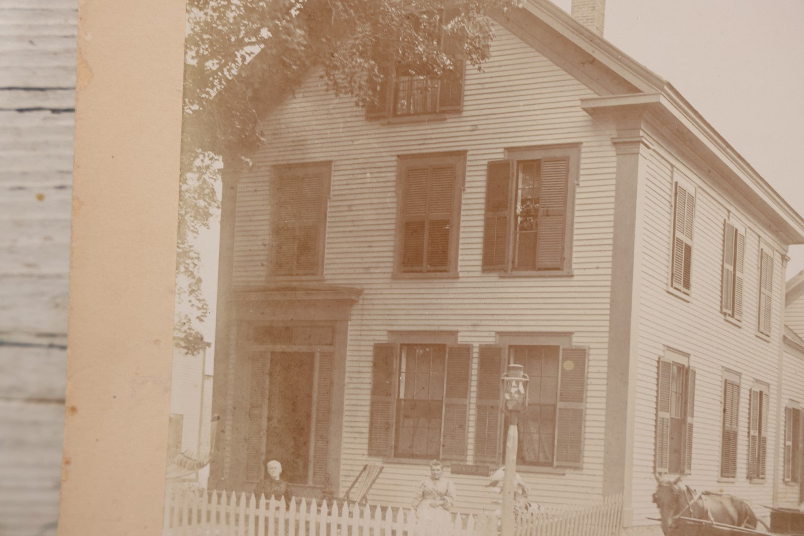 Lot 110 - Boarded Photo Of House Of Dr. E.W. Hoosoon With White Picket Fence, Family Outside, Man On Horse-Drawn Wagon, Photographed By E.W. Smith, Centre Harbor, N.H.