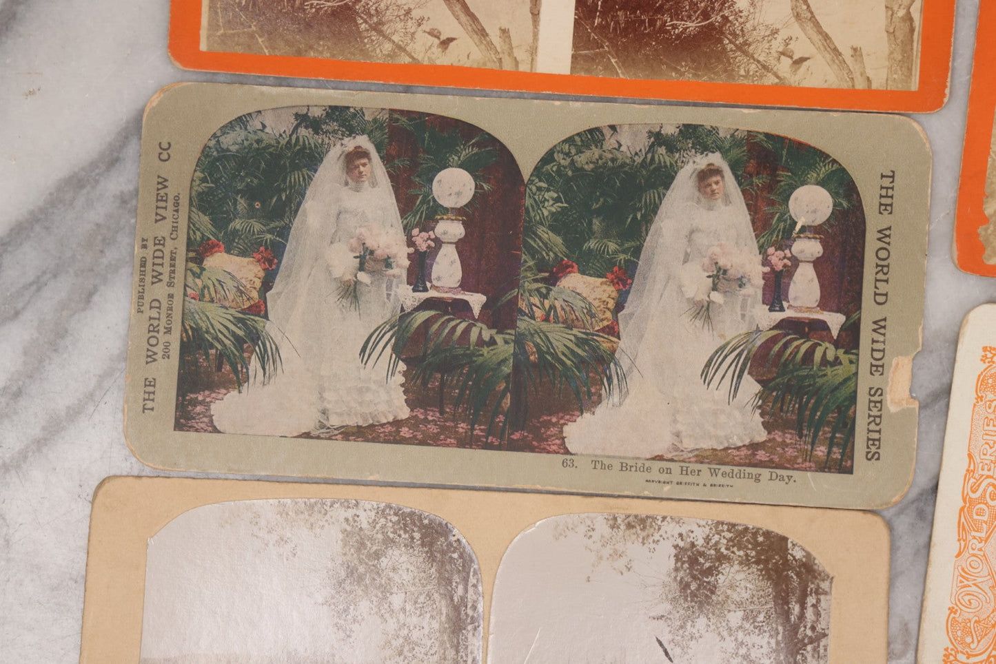 Lot 114 - Grouping Of 11 Stereoview Stereo Optic 3D Cards, Some In Color, Including Kissing, A Bride, Children With Their Pets, Wildlife, And Real Photo Stereocard Of Men Working With Lumber