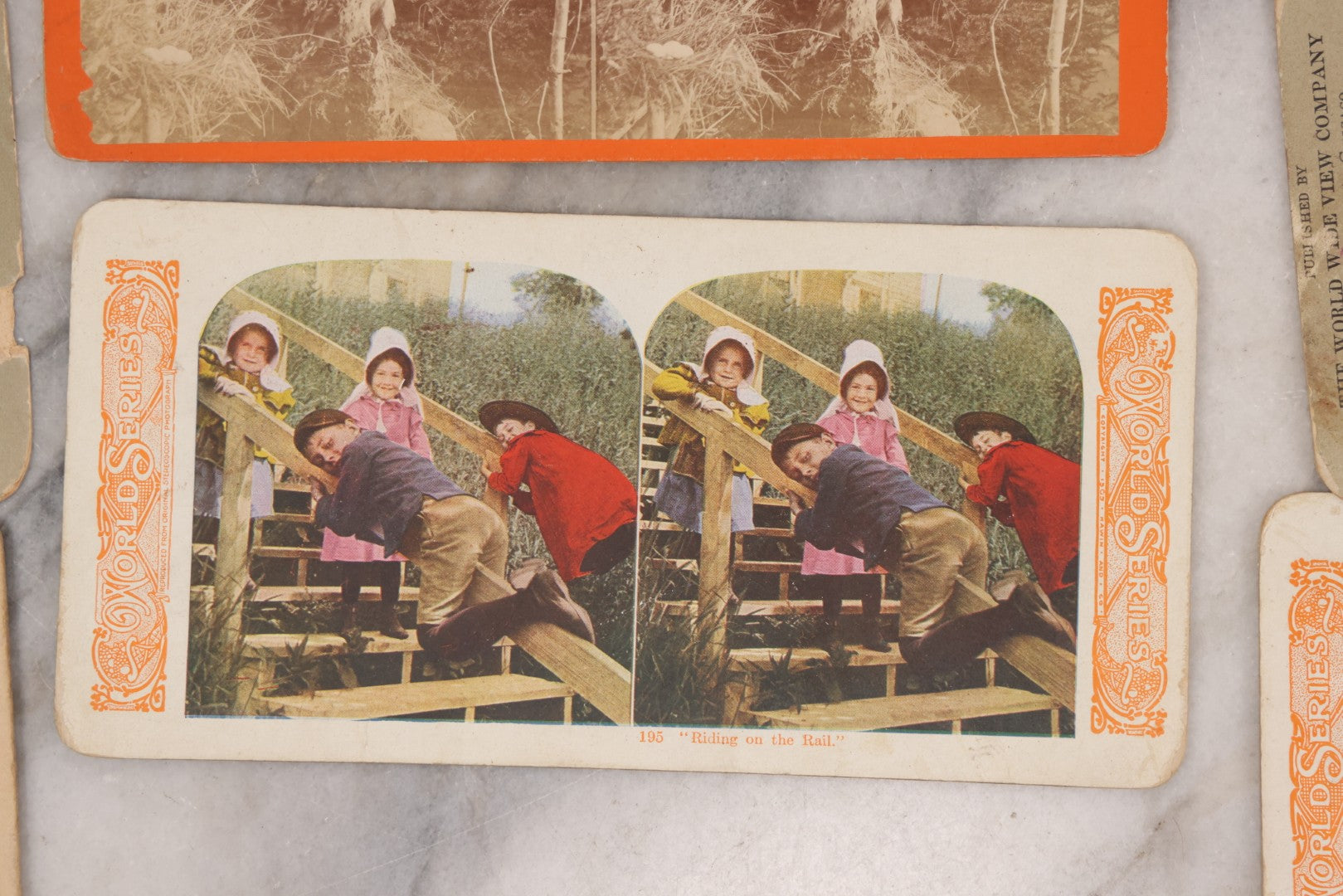 Lot 114 - Grouping Of 11 Stereoview Stereo Optic 3D Cards, Some In Color, Including Kissing, A Bride, Children With Their Pets, Wildlife, And Real Photo Stereocard Of Men Working With Lumber