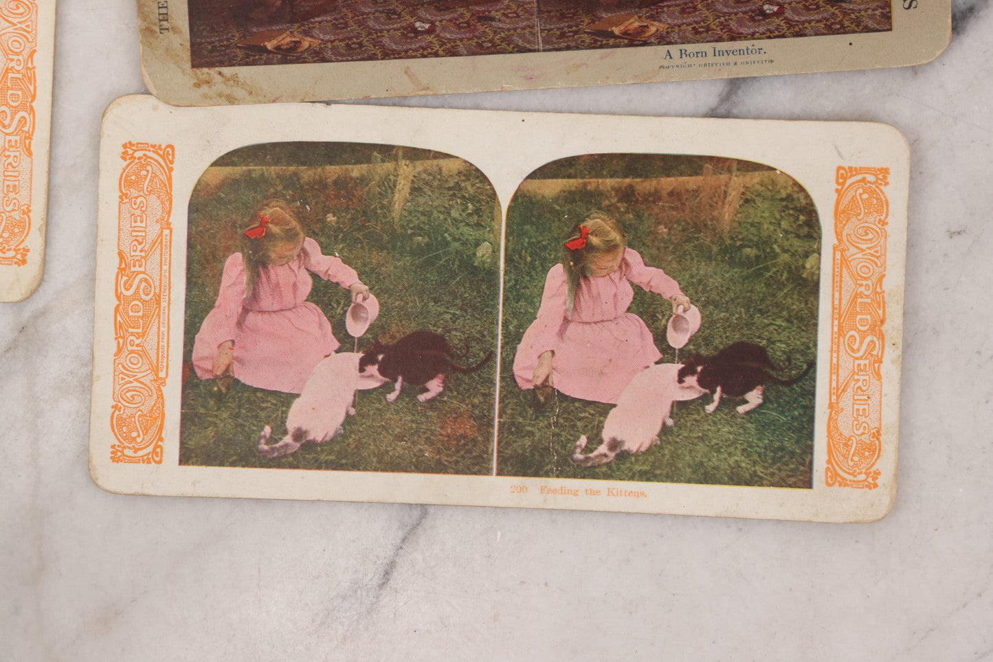 Lot 114 - Grouping Of 11 Stereoview Stereo Optic 3D Cards, Some In Color, Including Kissing, A Bride, Children With Their Pets, Wildlife, And Real Photo Stereocard Of Men Working With Lumber