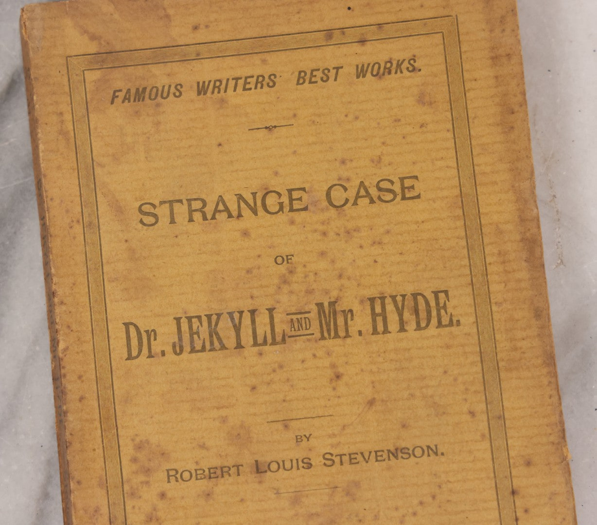Lot 121 - "Strange Case Of Dr. Jekyll And Mr. Hyde" Antique Paperback Edition Book By Robert Louis Stevenson, Published By J.H. And A.L. Brigham, Boston, Circa 1895