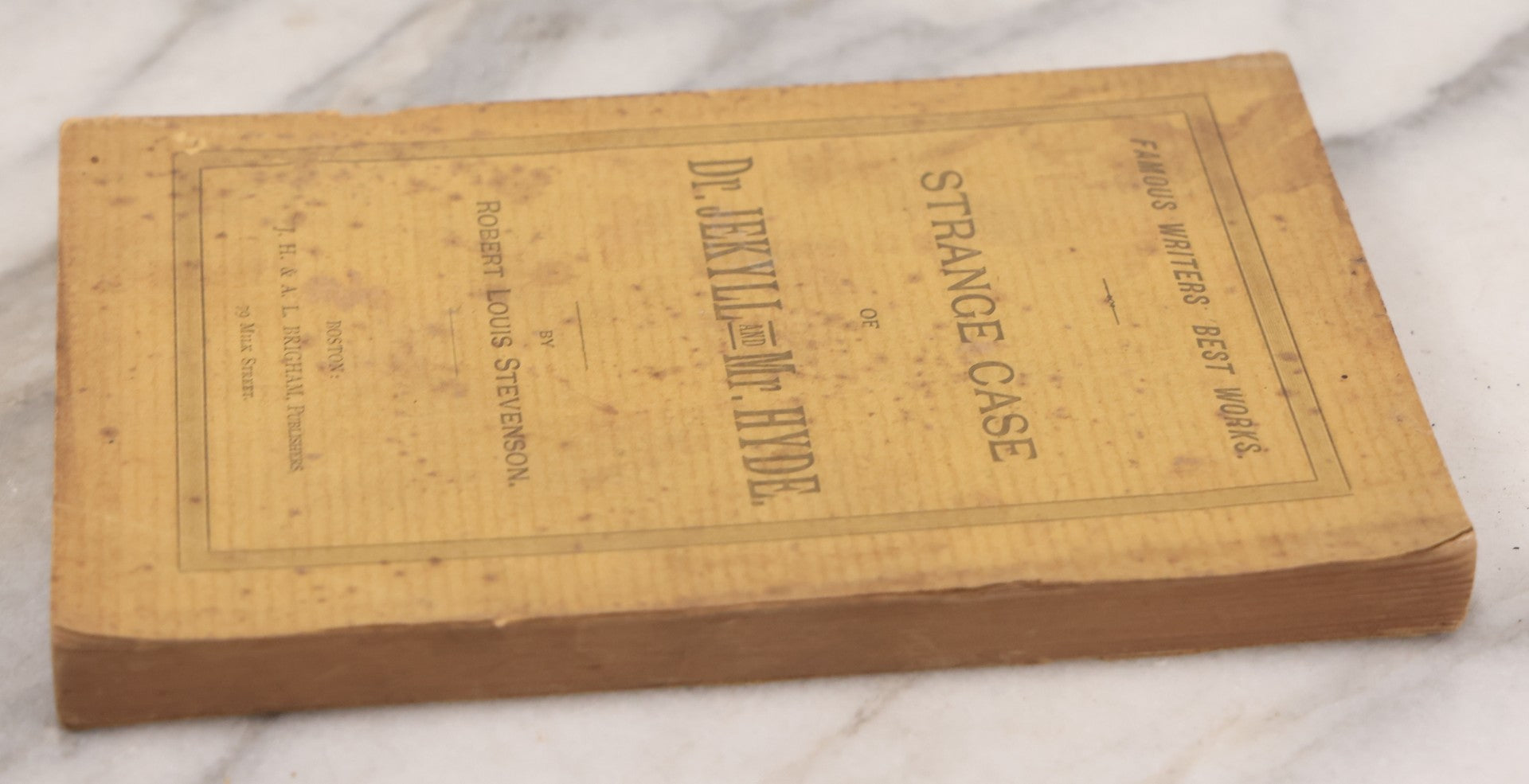 Lot 121 - "Strange Case Of Dr. Jekyll And Mr. Hyde" Antique Paperback Edition Book By Robert Louis Stevenson, Published By J.H. And A.L. Brigham, Boston, Circa 1895