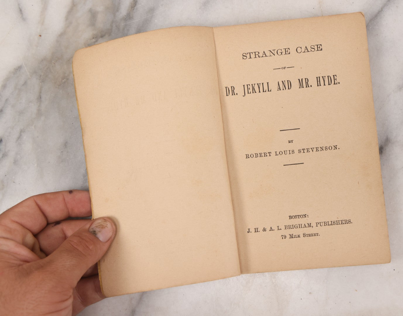 Lot 121 - "Strange Case Of Dr. Jekyll And Mr. Hyde" Antique Paperback Edition Book By Robert Louis Stevenson, Published By J.H. And A.L. Brigham, Boston, Circa 1895