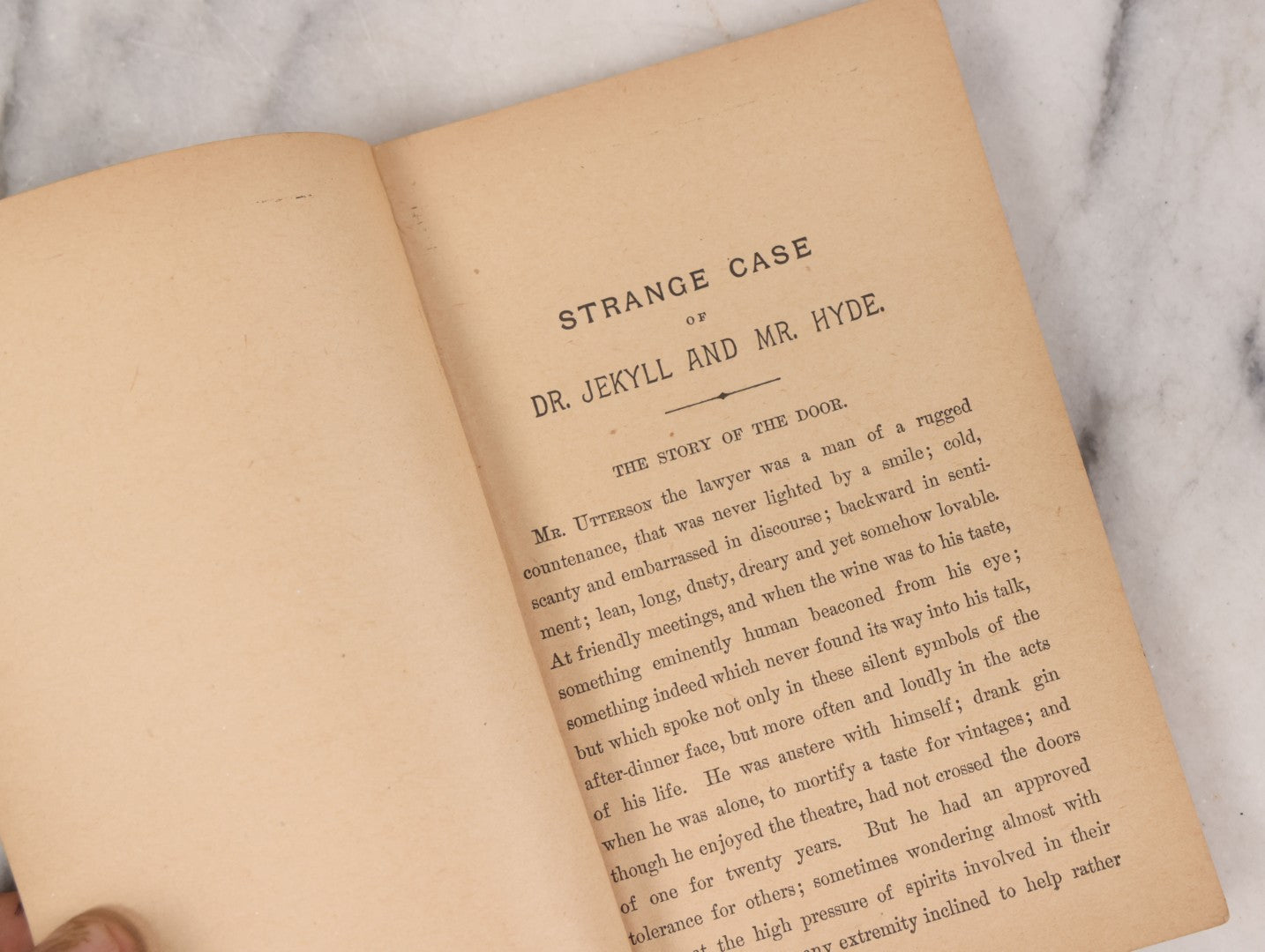 Lot 121 - "Strange Case Of Dr. Jekyll And Mr. Hyde" Antique Paperback Edition Book By Robert Louis Stevenson, Published By J.H. And A.L. Brigham, Boston, Circa 1895