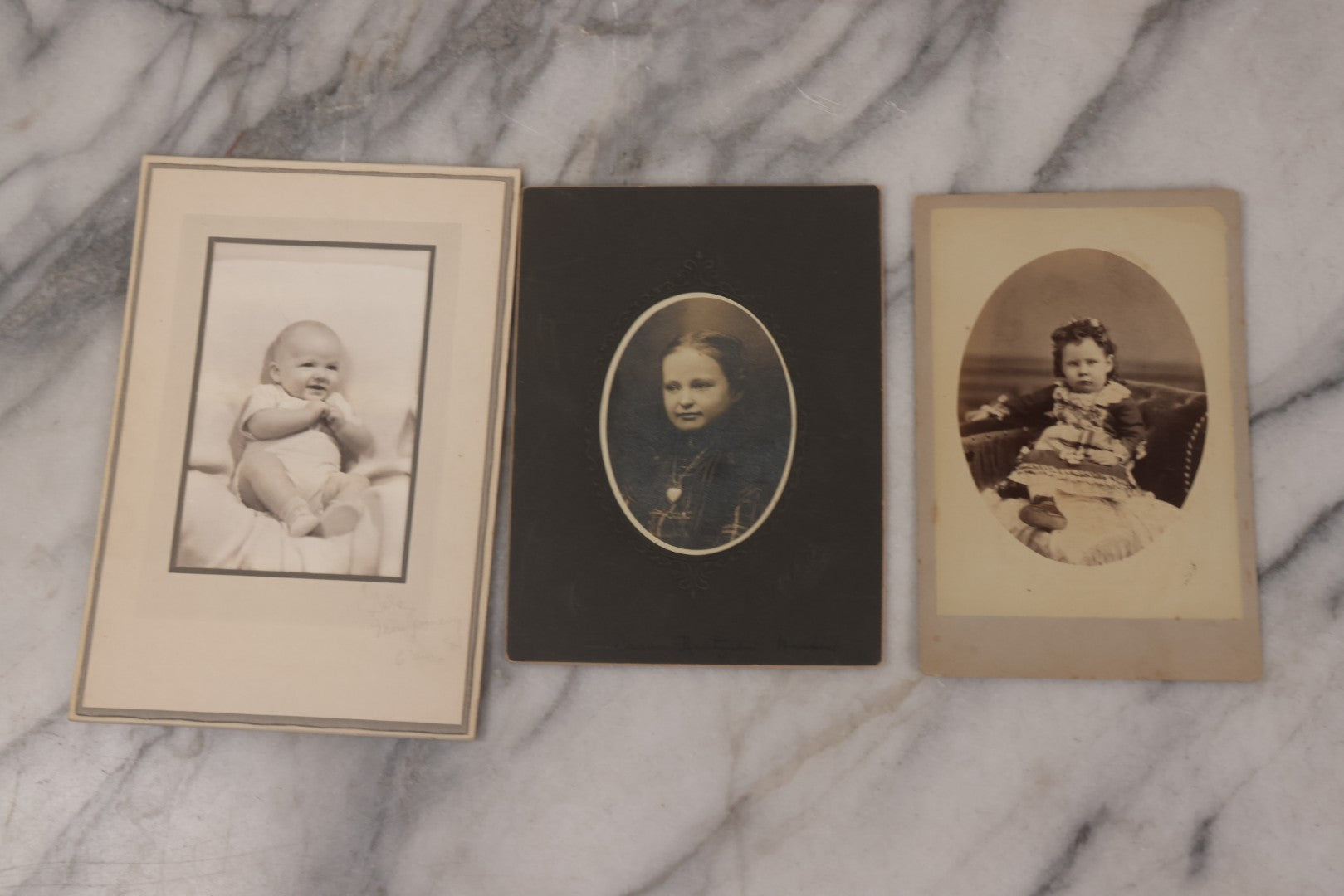 Lot 158 - Grouping Of Fifteen Antique Cabinet Card Photographs Of Men, Women, And Children, Including Woman Holding Hat With Umbrella, Parents With Child, Girl With Locket, And More