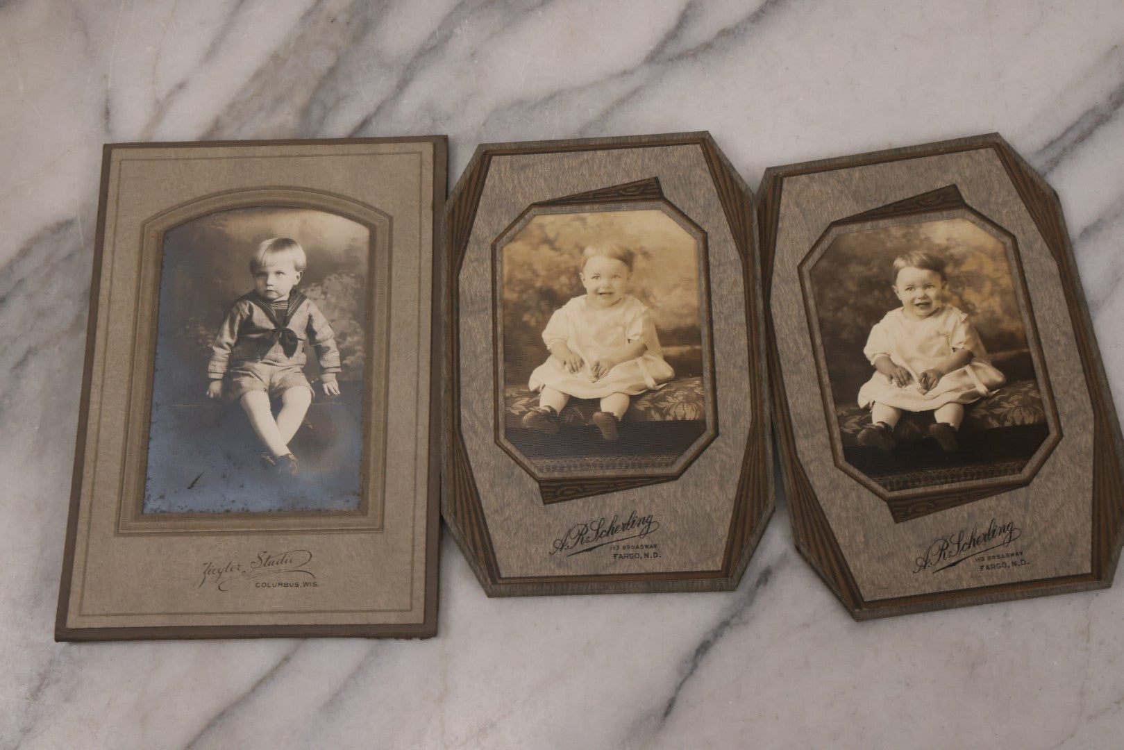 Lot 161 - Grouping Of 11 Antique Boarded, Cabinet Card, And Other Photographs, Including Portrait Of Three Young Men, Baby On Rocking Chair, Wedding Portraits, And More