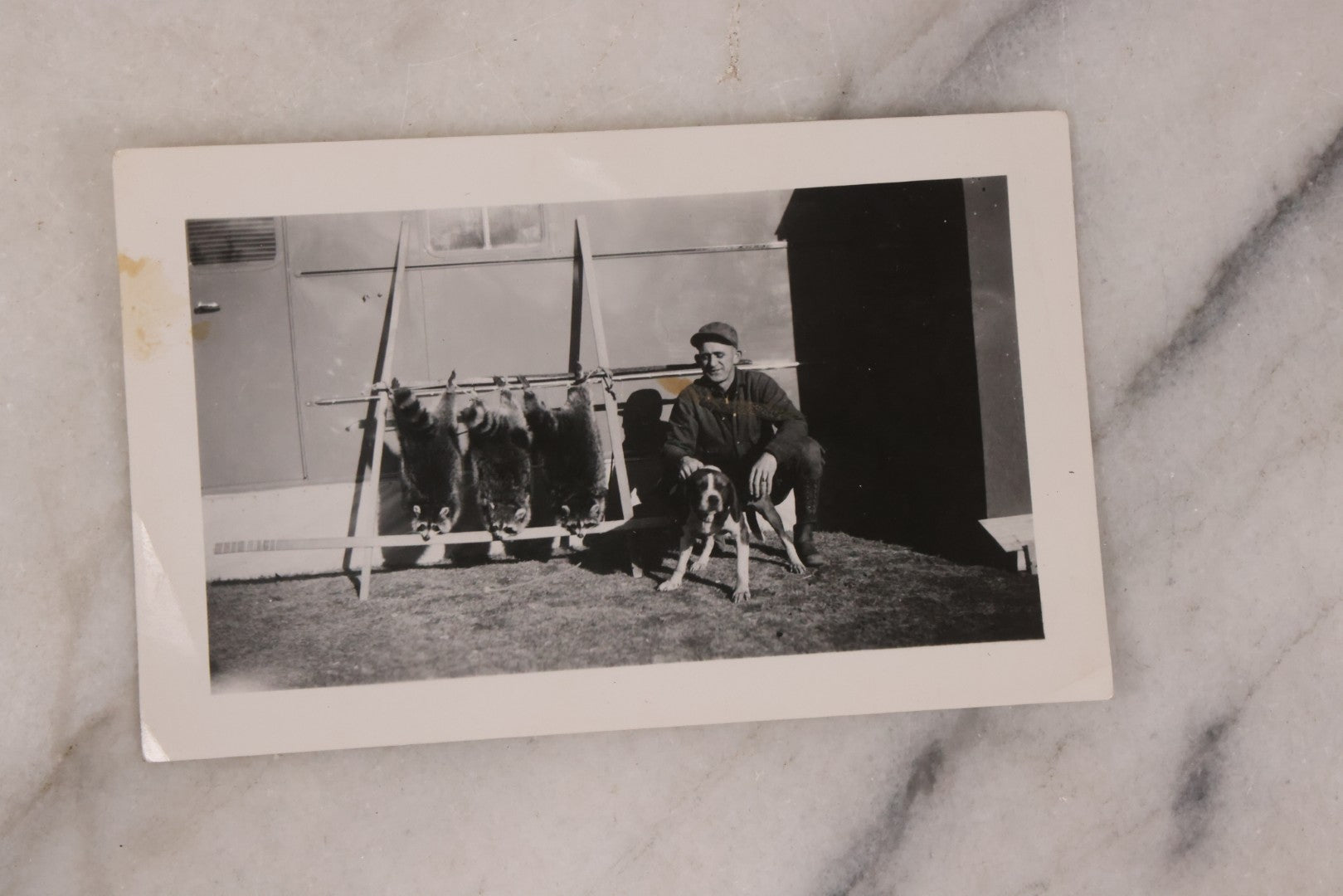 Lot 165 - Grouping Of Nine Vintage Snapshot Photographs Of Outdoorsmen, Hunters, Trappers, Fisherman, And Their Catches, Including Many Photos Of Furs, Hunting Dogs, Etc.