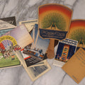 Lot 170 - Vintage Ephemera Grouping Including "Charm Of Color" Ad Fans, "All About Milk" Booklet, Chicago World's Fair Collectibles, Travel Brochures, And More