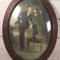 Lot 010 - Antique Hand Colored Solar Enlargement Photograph Of World War One Era United States Navy Sailor In Faux Wood Oval Bubble Glass Frame, 16-5/8" x 22-3/4"