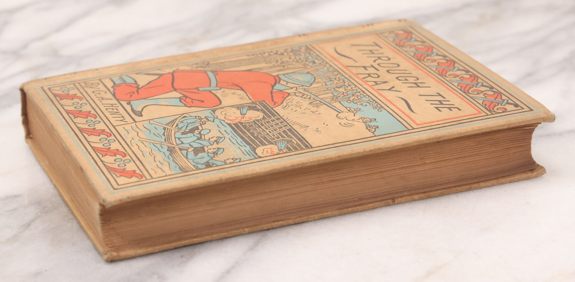 Lot 125 - "Through The Fray; A Tale Of The Luddite Riots" Antique Illustrated Novel By G.A. Henty, Cover And Spine Featuring Depictions Of Weapons And Battle Scenes, Published By A.L. Burt, New York, Circa 1900