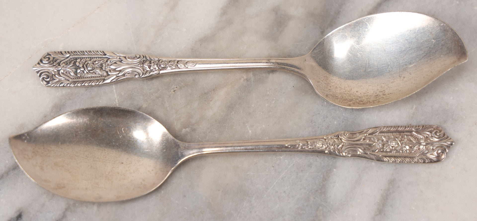 Lot 019 - Antique Pair Of Sterling Silver Curved Pointed Scooping Spoons, Decorative Handles With Rose Motif, Marked Westmoreland Sterling, Total Weight 1.9 Troy Ounces