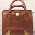 Lot 021 - Vintage Italian Leather Occupational Handbag By The Whip DI Roma With Segmented Interior And Bottom Compartment, Stamped “The Whip Roma, V. S. Sebastianello, P. DI Spagna,” Made For Abercrombie & Fitch, With Keys And Accessories