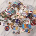 Lot 037 - Grouping Of 85+ Vintage And Modern Pins Including Winter Sports, Skiing, Figure Skating, Racing, Golf, Aviation, And Broadcasting, With Examples From A.B.C., N.B.C., And Several In Sterling Silver