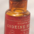 Lot 053 - Antique Mallinckrodt Chemical Works “Codeine Sulfate” Powder U.S.P. Amber Glass Bottle With Red Poison Label Featuring Skull And Crossbones, 1/8 Oz. Size, St. Louis & New York, Marked Food And Drugs Act 1906, 2-5/8" H