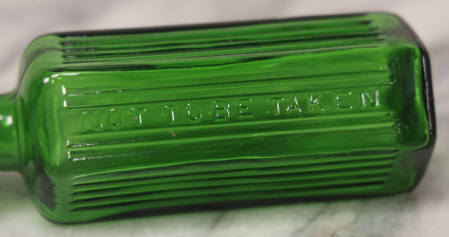 Lot 063 - Pair Of Antique Green Glass Poison Bottles With Embossed Lettering “Not To Be Taken,” Vertical Poison Ribs, Including Hexagonal 8Oz And Rectangular 4 Oz Sizes