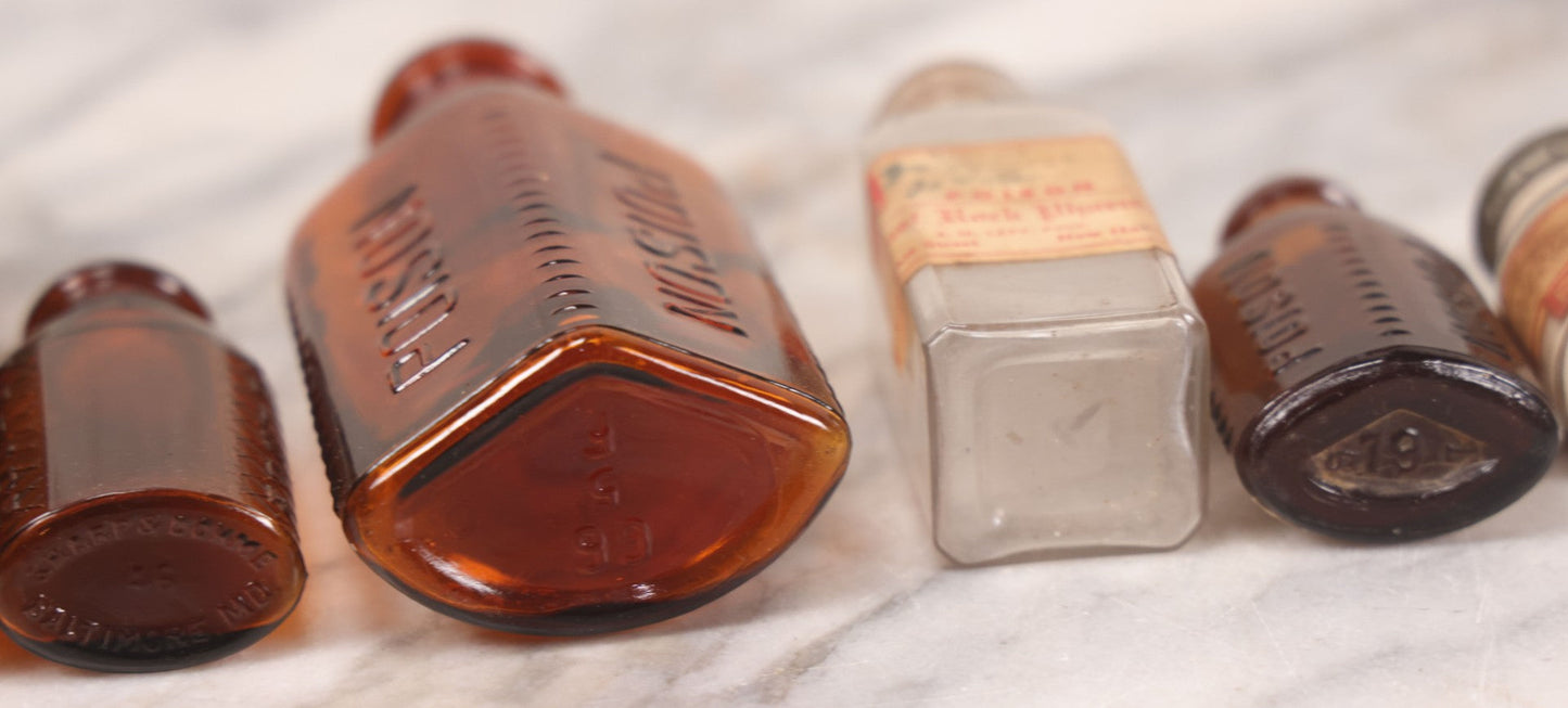Lot 069 - Grouping Of Six Antique Poison Bottles Including Amber With Crosshatch Poison Ribs, Eli Lilly & Co. Diamond Antiseptics, Clear Chinum Arsenate With Eimer & Amend Lid, East Rock Pharmacy New Haven, And Liggett's Springfield, Ma