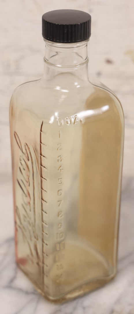 Lot 077 - Pair Of Vintage Clear Glass Embalming Fluid Bottles With Paper Labels And Caps Including Regal Arterial From Regal Fluid Co., Washington, D.C., And Hydrol Phenox From Hydrol Chemical Co., Philadelphia