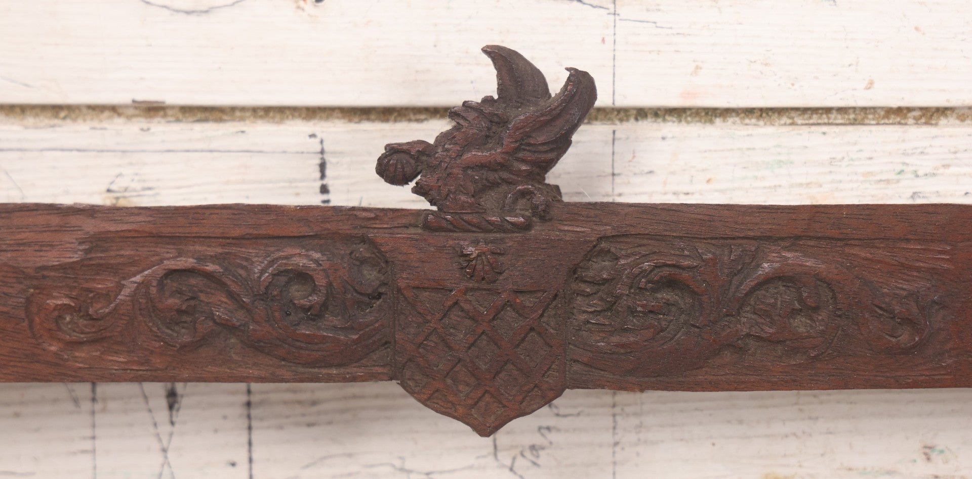 Lot 086 - Antique Hand Carved Wood Folk Art Frame With Griffin Motif, Coat Of Arms, Cherub Corners, Original Finish, 18-1/2" x 9-1/4"
