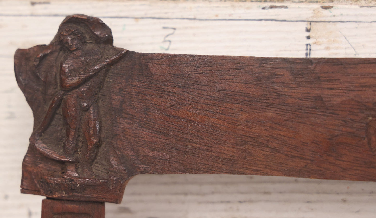 Lot 086 - Antique Hand Carved Wood Folk Art Frame With Griffin Motif, Coat Of Arms, Cherub Corners, Original Finish, 18-1/2" x 9-1/4"