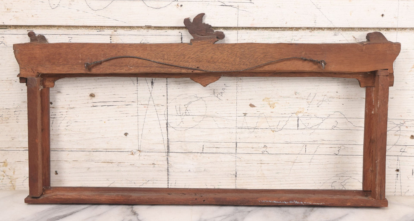 Lot 086 - Antique Hand Carved Wood Folk Art Frame With Griffin Motif, Coat Of Arms, Cherub Corners, Original Finish, 18-1/2" x 9-1/4"