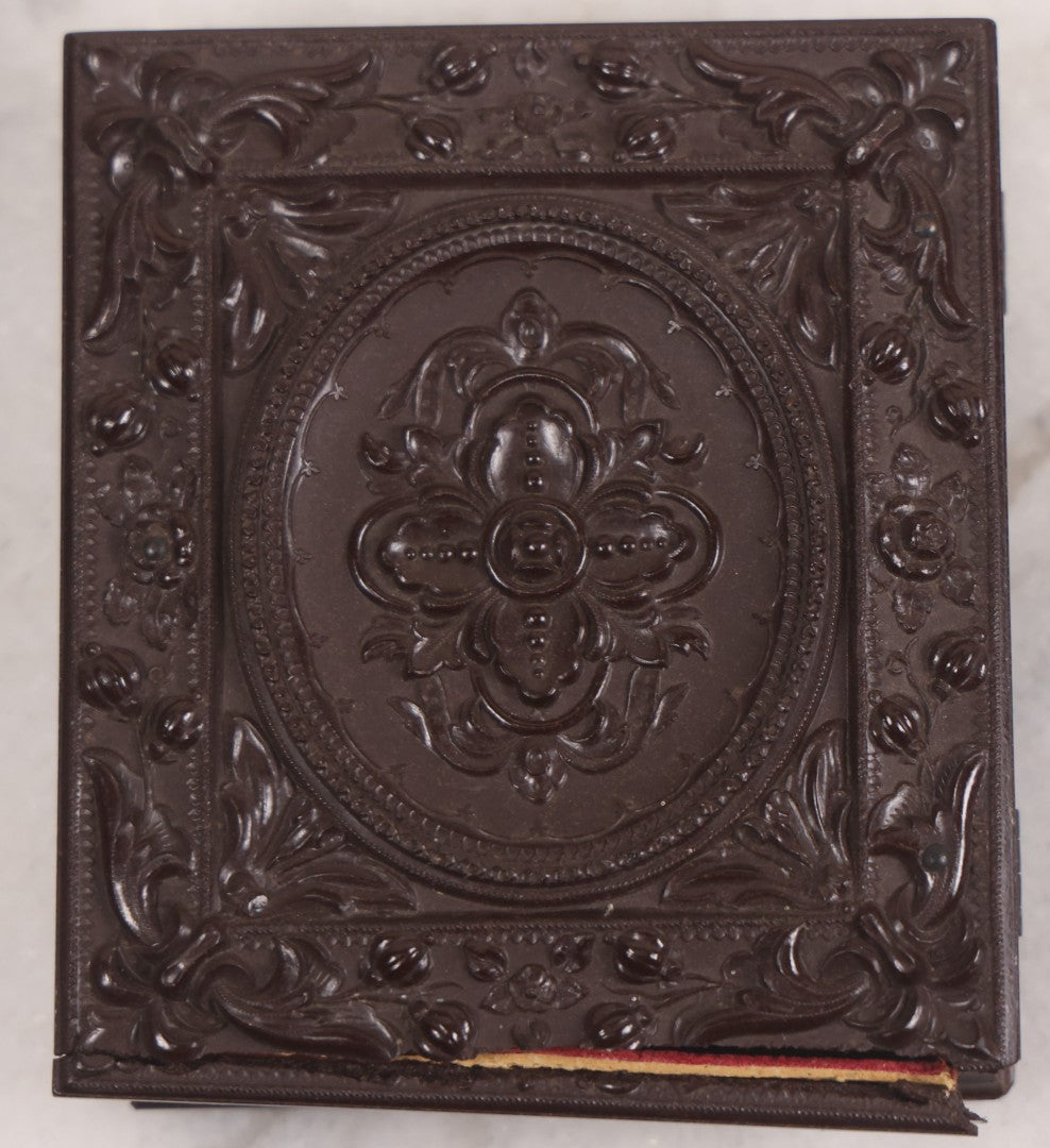 Lot 094 - Antique 1/6th Plate Daguerreotype Photograph Of Man In Full Thermoplastic Case With Abstract Floral Design, Brass Mat, Dark Red Cushion, Heavily Speckled Surface Of Photograph, Note Damage To Case