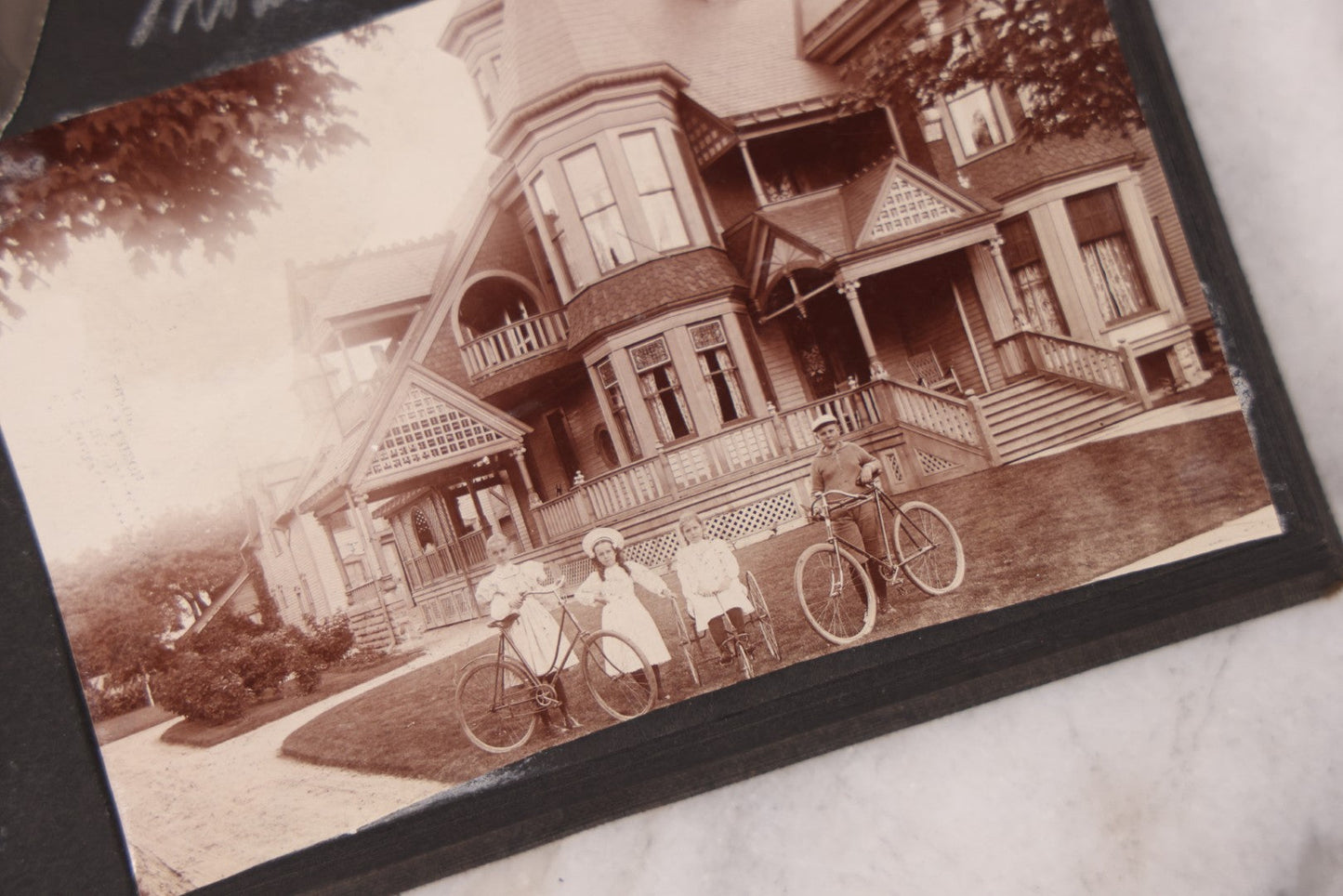 Lot 095 - Antique Family Photo Album With 25+ Portrait And Snapshot Photographs, Mostly Of Children, Including New York Sightseeing Trolley Photo, And Several Additional Loose Snapshot Photos