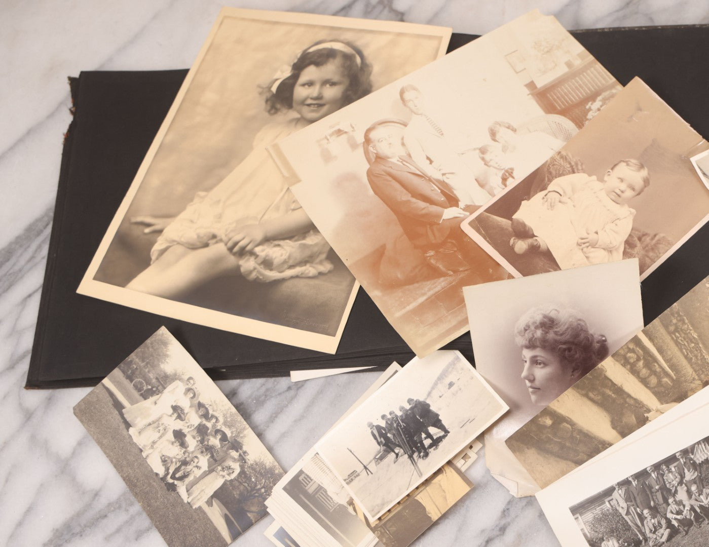 Lot 095 - Antique Family Photo Album With 25+ Portrait And Snapshot Photographs, Mostly Of Children, Including New York Sightseeing Trolley Photo, And Several Additional Loose Snapshot Photos