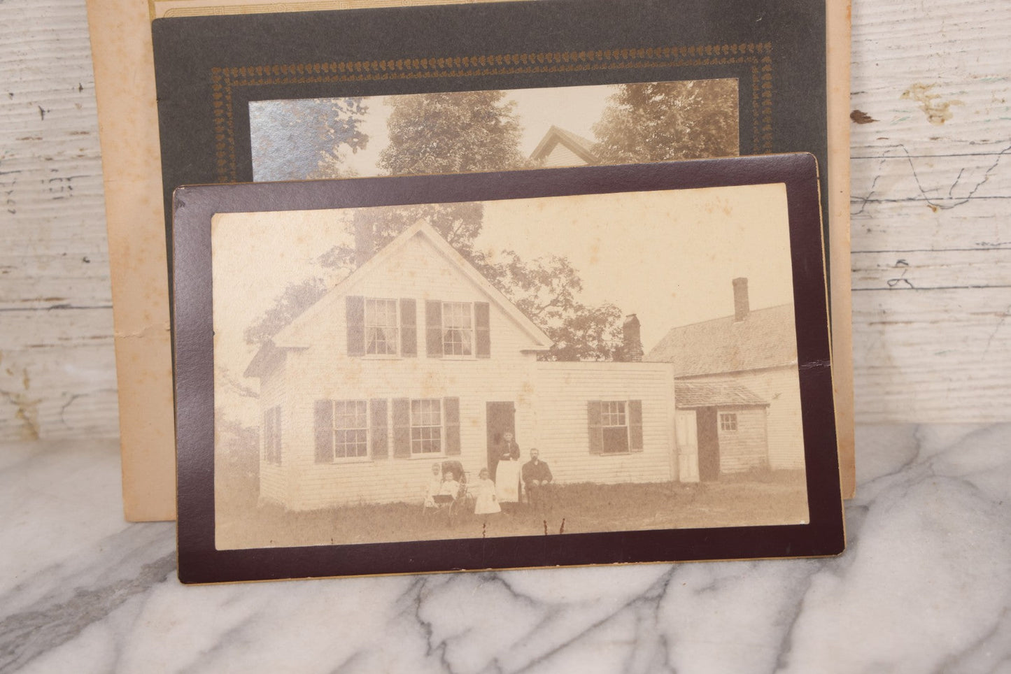 Lot 101 - Grouping Of Four Antique Boarded Photos Of Large Colonial Houses And Families