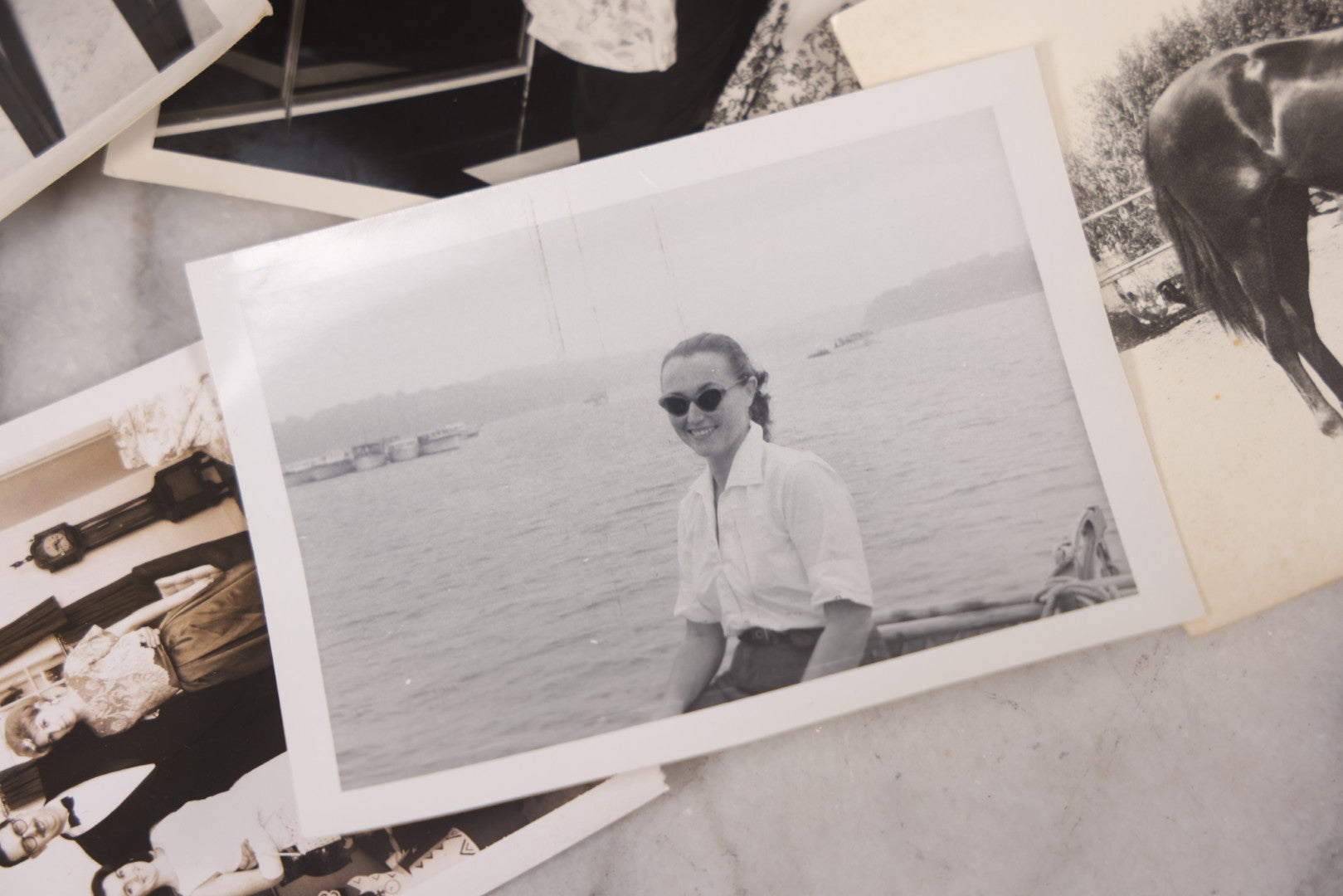Lot 103 - Grouping Of Thirteen Vintage Snapshot And Other Mixed Photographs Including Woman In Costume, M.G. Conference, Woman With Cat And Dog, Postcard Of Woman Water Skiing, Horse, Circa 1960s